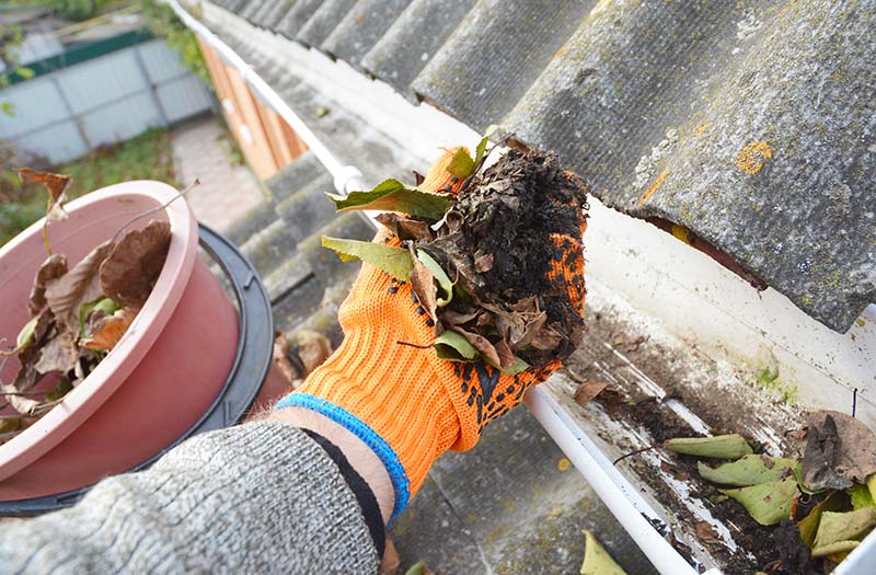 A.J.’s Seamless Gutters cleaning residential gutters