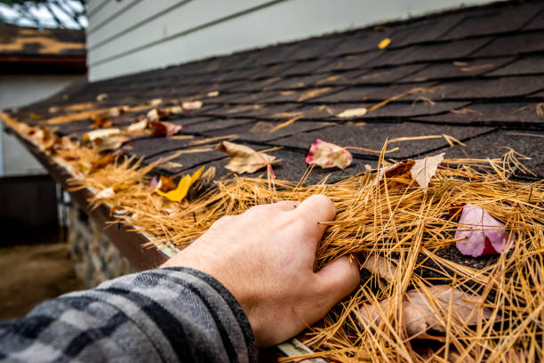 A.J.’s Seamless Gutters cleaning residential gutters in Pasadena, TX